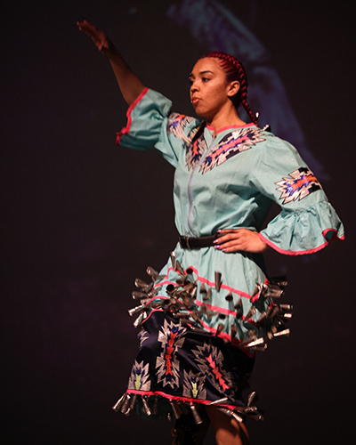 A student performs a traditional dance at Cornell College's Culture Show in 2025.