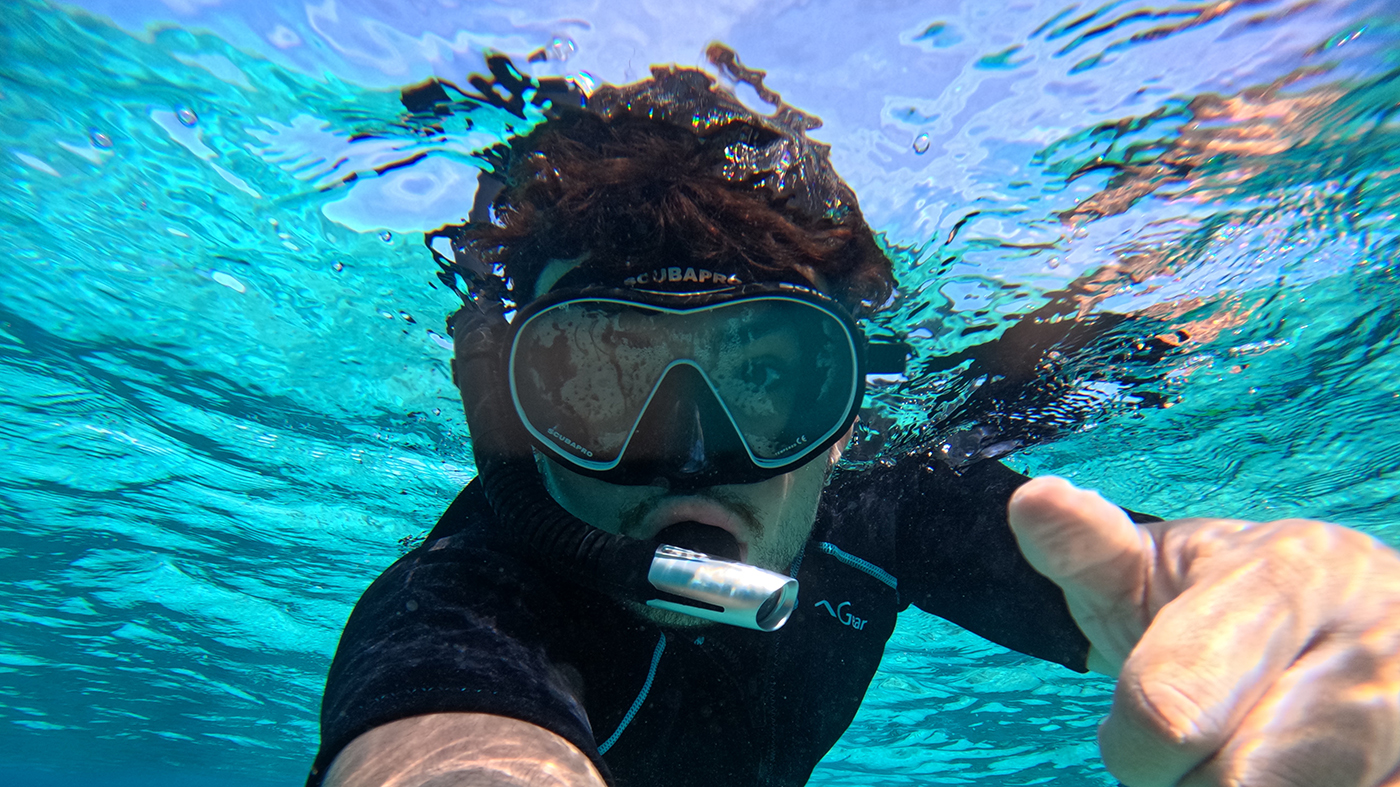 Gabriel Muñoz '26 snorkeling at South Water Caye during his 2025 Study Abroad block in Belize