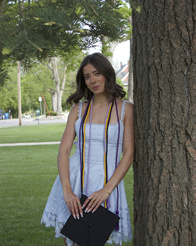 Gwen Westervelt '26 poses for a photo outside the SAW after Commencement.