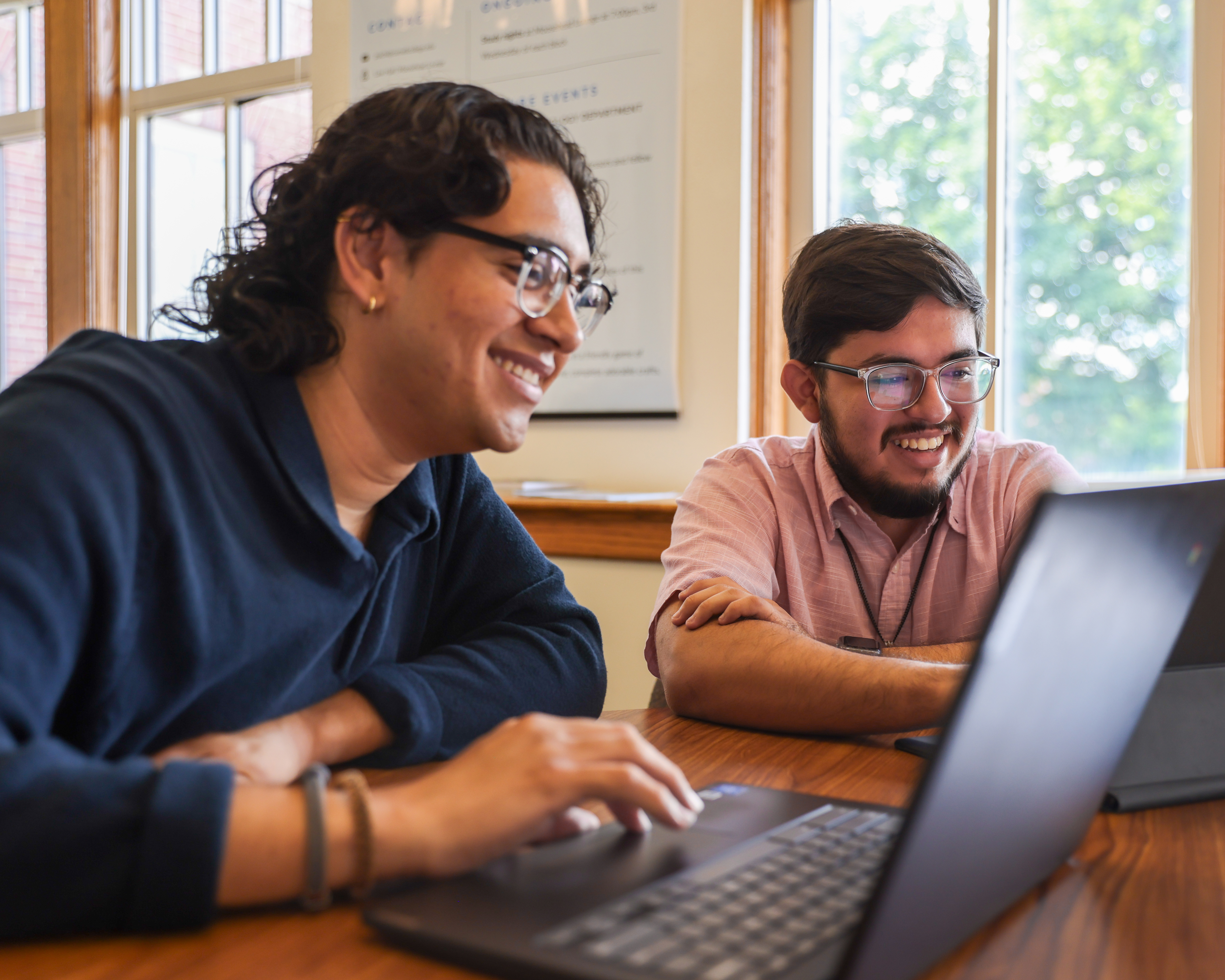 Román Bonilla ’27 and Valentin Andrade ’27 review results from their CSRI study on political identity signals.