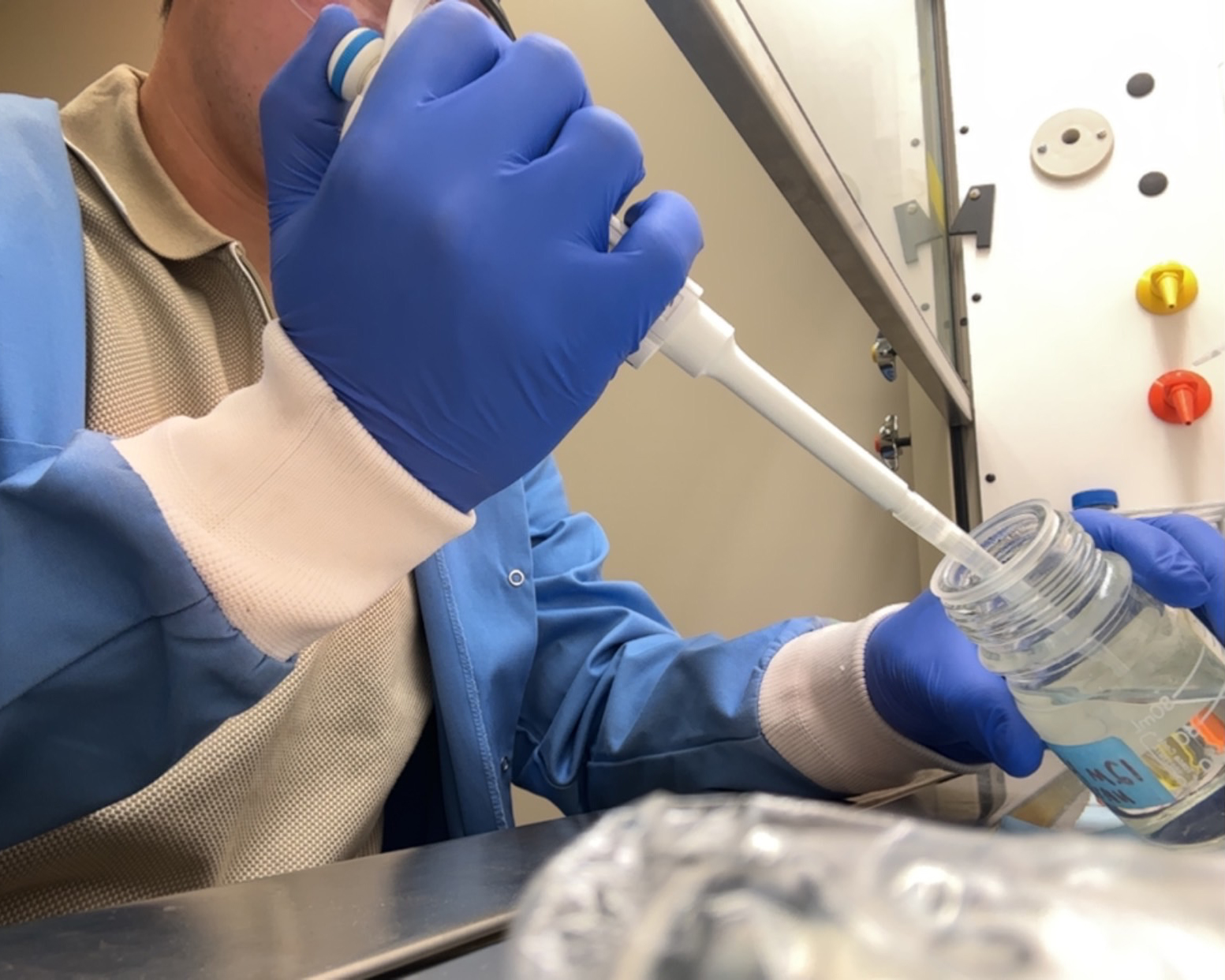 Gavin Collyott '29 using a pipette at his internship in Colorado