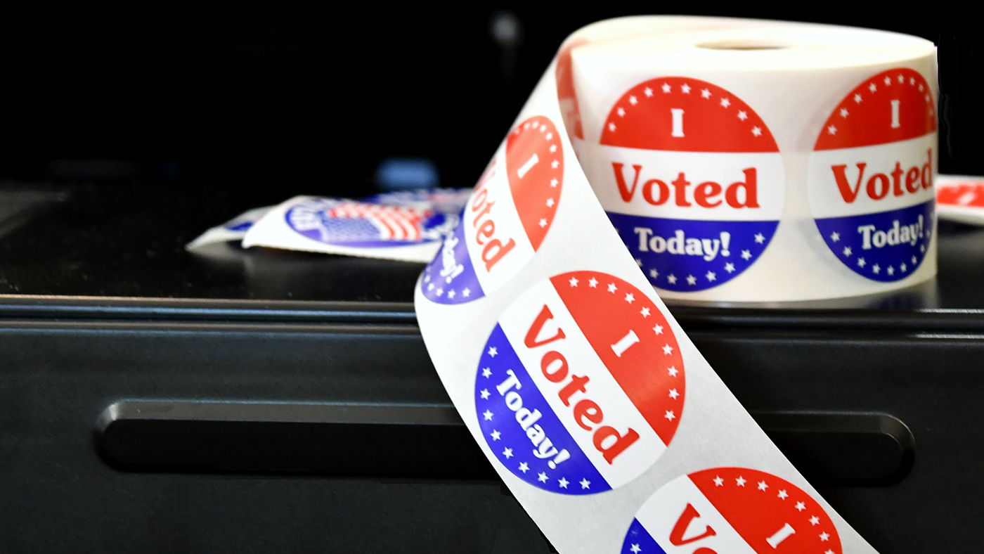 Voting stickers on a table.