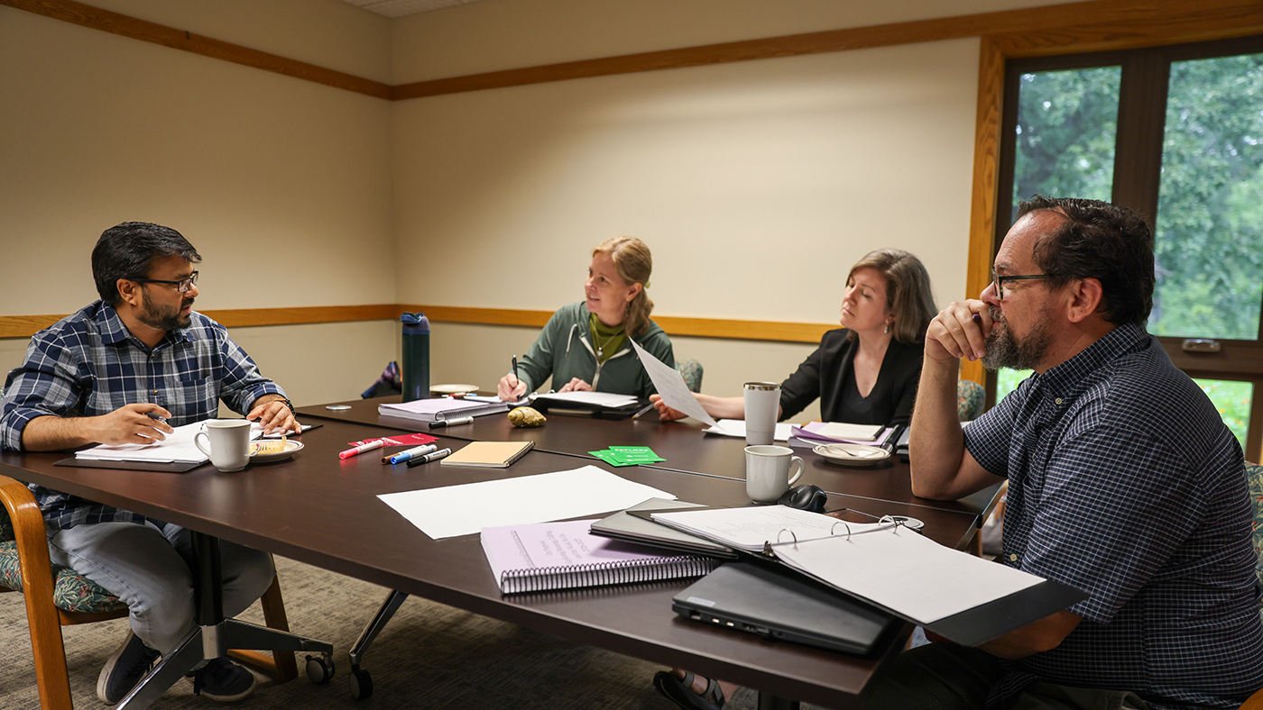 Faculty and staff work together as a summer Professional Development gathering.