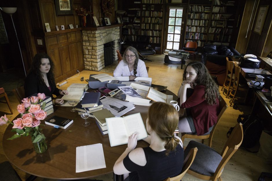 Maureen Sullivan ’18, Emma Jean Meyer ’19, Jessica Halter ’18 , and Professor Leslie Kathleen Hankins work in the Van Etten-Lacey House. 14