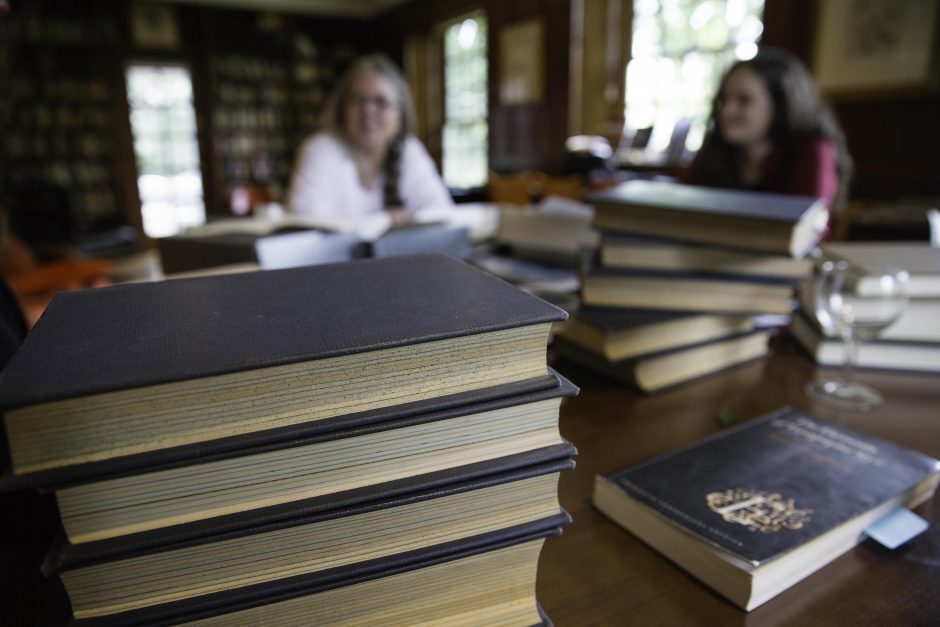 Maureen Sullivan ’18, Emma Jean Meyer ’19, Jessica Halter ’18 , and Professor Leslie Kathleen Hankins work in the Van Etten-Lacey House. 12