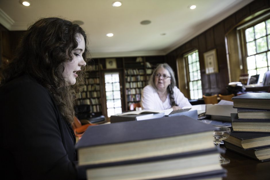 Maureen Sullivan ’18, Emma Jean Meyer ’19, Jessica Halter ’18 , and Professor Leslie Kathleen Hankins work in the Van Etten-Lacey House. 11