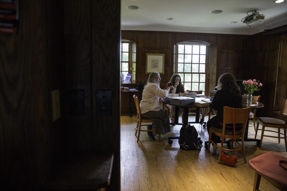 Maureen Sullivan ’18, Emma Jean Meyer ’19, Jessica Halter ’18 , and Professor Leslie Kathleen Hankins work in the Van Etten-Lacey House. 9