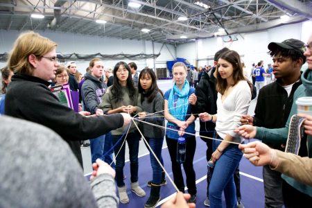 Students participate in a refugee simulation.