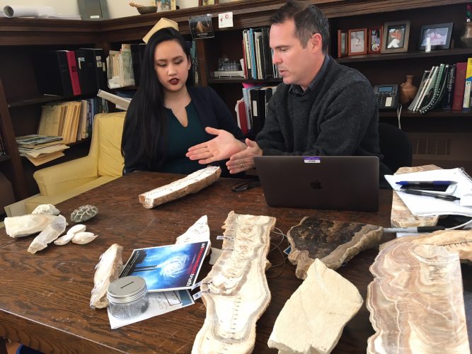 Professor Rhawn Denniston and Huong Quynh Anh Nguyen ’19 discussing a stalagmite