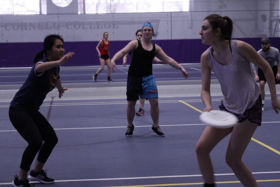 Students playing ultimate frisbee