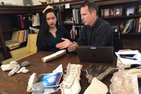 Professor Rhawn Denniston and Huong Quynh Anh Nguyen ’19 discussing a stalagmite