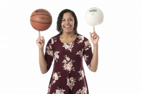 Photo of Diamond Boyd with a basketball and volleyball.