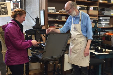 annah Robertson '18 learns about book making.