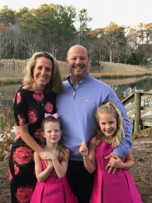 Scott Provinse with his two daughters and wife