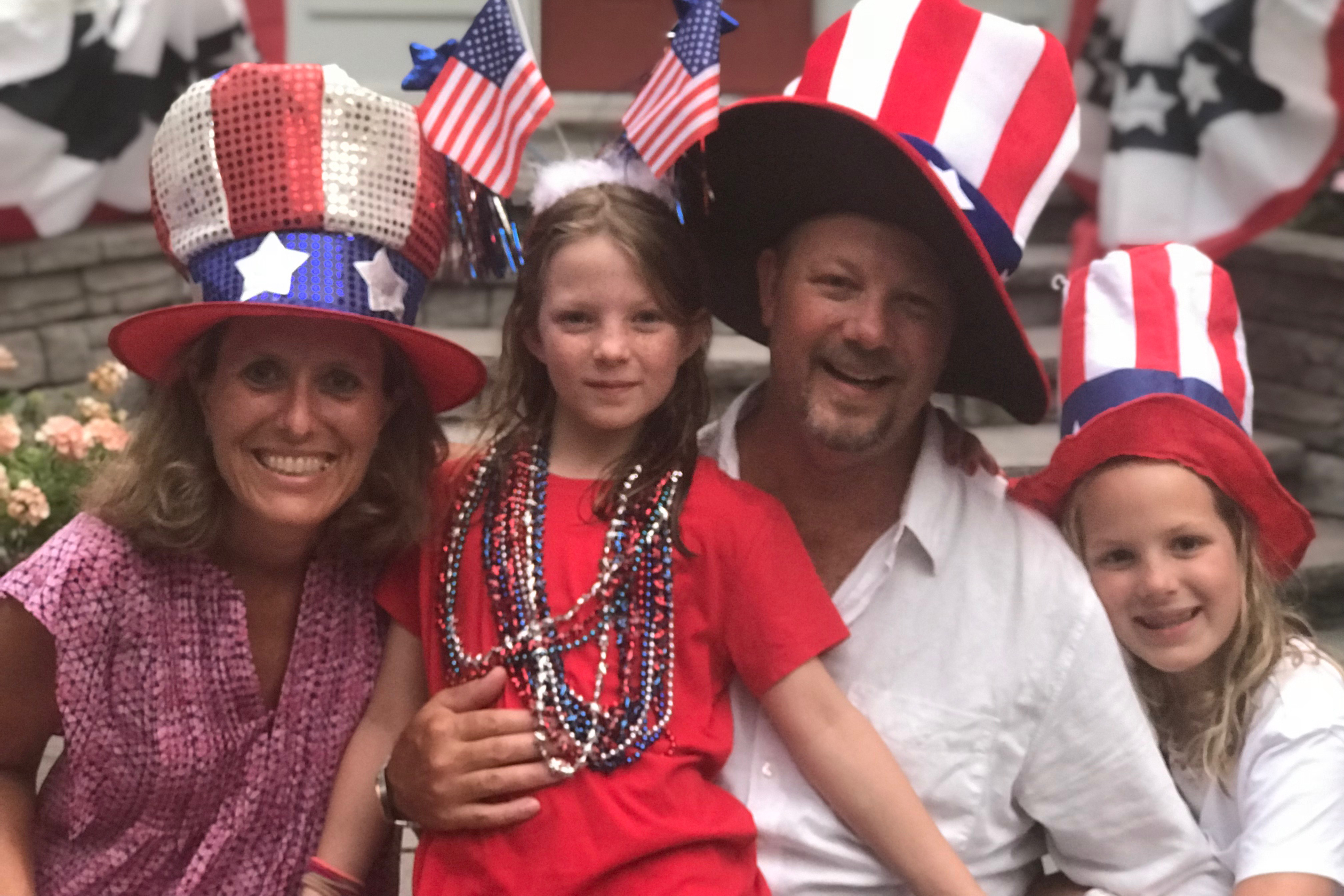 Scott Provinse with his two daughters and wife