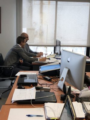 Ethan Berube working at a desk during his internship