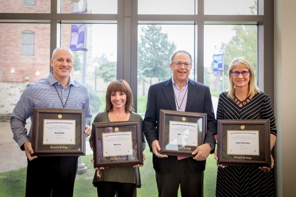 (pictured from left) Matt Casebolt ’98, Lisa Ikola accepting for the late wrestling coach Mike Duroe, Jake Remes ’80, Sherri Pettit ’88 