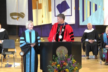 Dorothy Ashbacher Lincoln-Smith '58 accepting Homecoming award