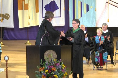 Kenneth Patterson '83 accepting Homecoming award