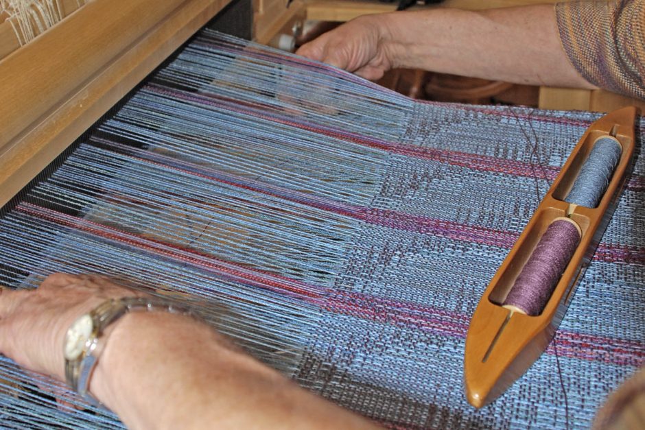 Diane Crowder weaving close-up