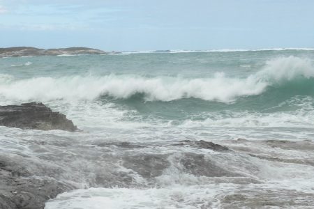 wave and rocks on the beach