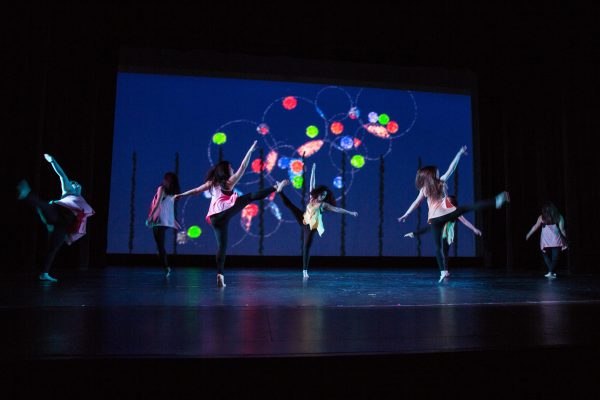 Students dancing on stage