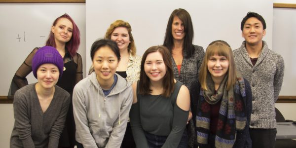 Students and Professor Green smile for a group photo