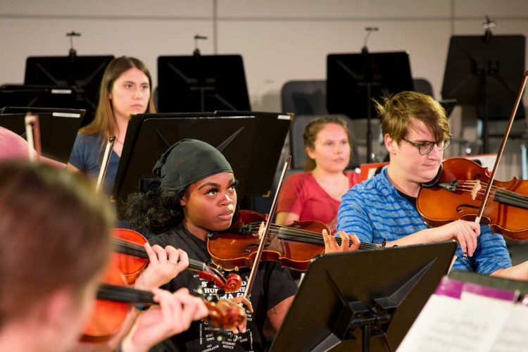 Ici Collier at orchestra rehearsal