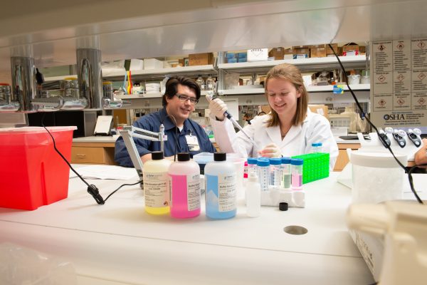 Zoe Randall working with Mark Niciu at the University of Iowa (Photo Courtesy University of Iowa)