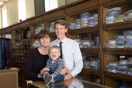 Olivia Cotton Randall ’13 and Josh Randall ’14, seen with their son Paul