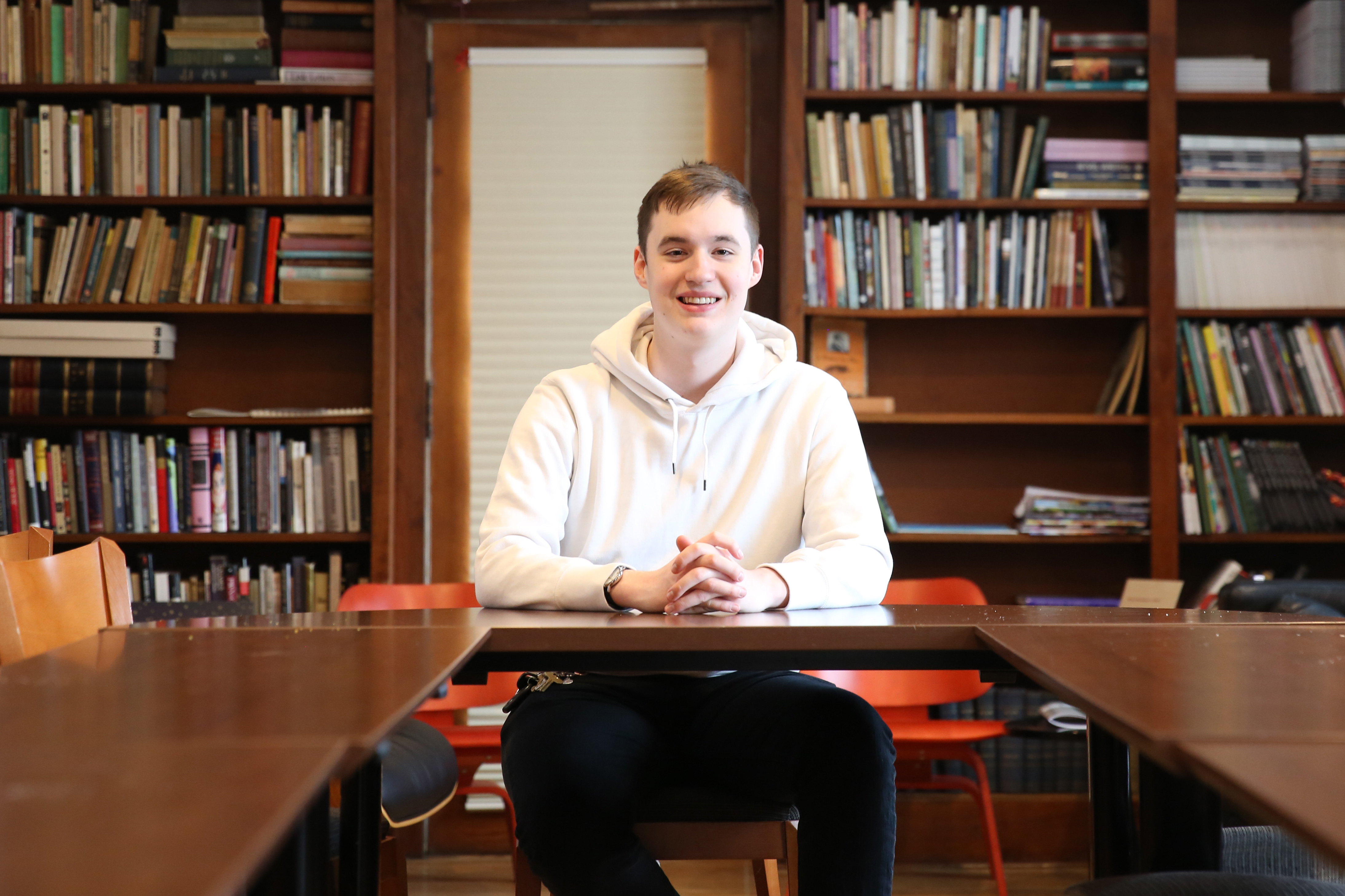Sophomore Connor Kenney inside Van Etten-Lacey House.