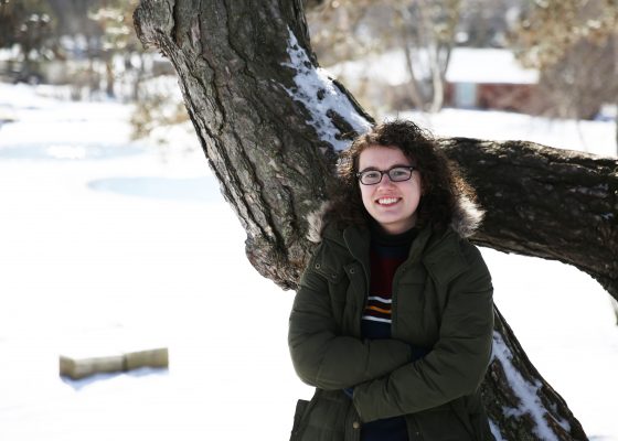 Natalie Bradshaw stands near Ink Pond on Cornell's campus.