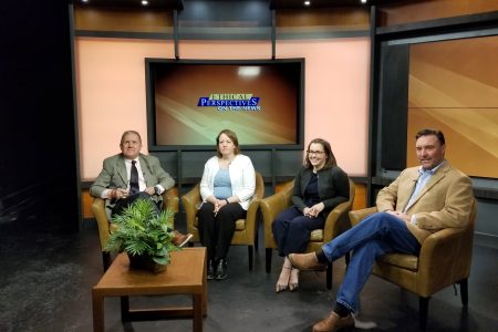 four people sitting on a tv set for "Ethical Perspectives"