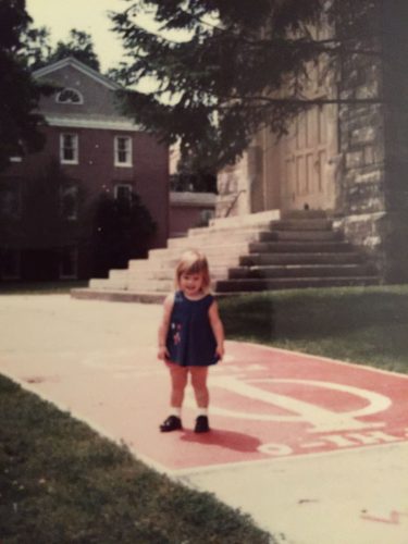 Ilene Crawford stands before King Chapel as a toddler during a campus visit with her parents, Nancy Charleston Crawford ’69 and Marlin "Jack" Crawford ’69.