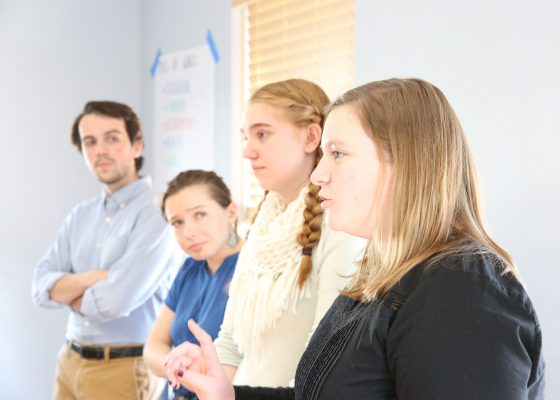 Students present findings in front of staff at Willis Dady