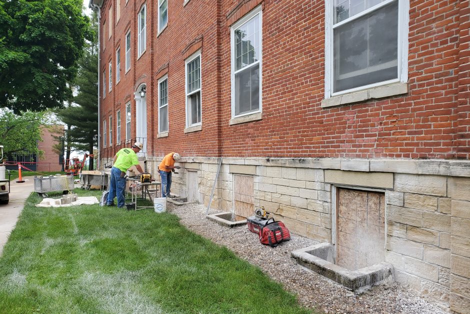 Working on the stones on College Hall