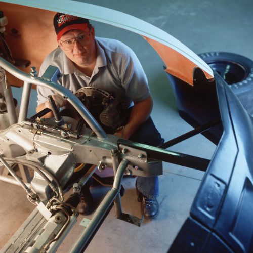 Jerry Savitsky in 2002, working on a race car.