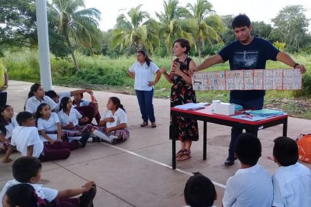 Landry-Montes teaches middle school students in the Maya town of Calotmul, Yucatan, Mexico, about the Dresden Codex, an ancient Maya book.