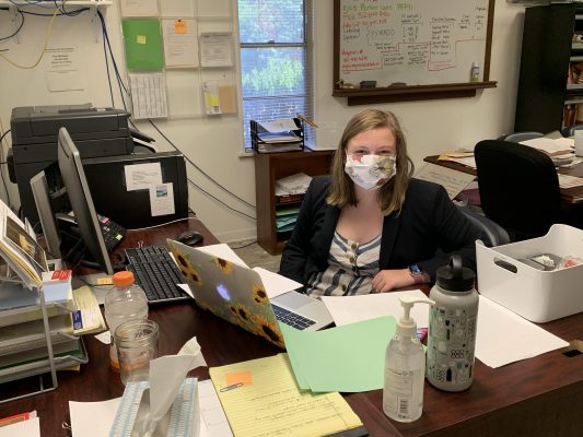 Brena Levy working at her desk