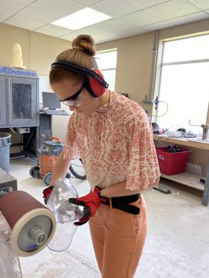 Sarah Carvo working at her internship to make prosthetics