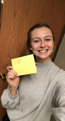 College student with written letter