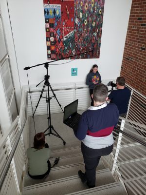 From left to right: Maggie McClellan, West, Josie Wulf, and Scott Olinger filming and recording Wulf's spoken word.