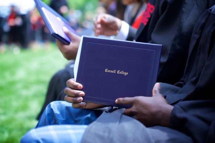 Commencement photo with diploma cover