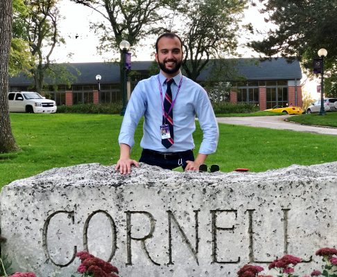 Sunny Khan, Class of 2021, by the Cornell sign