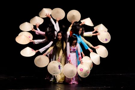 Performing the Vietnamese conical hat dance in 2014 are Linh Nguyen ’16, Linda Nguyen ’14, Julie Hoang ’16 (from center left with faces visible), Anh Pham ’16, Ngoc Nguyen ’17, Addy Dam ’14, Bao-Chau Do ’15, Thao Luu ’16, and Theresa Dinh ’16.