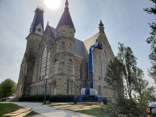 photo of King Chapel with heavy equipment for observing damage