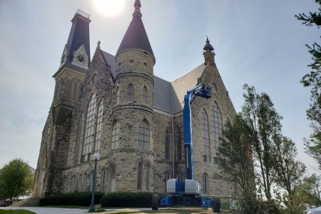 photo of King Chapel with heavy equipment for observing damage