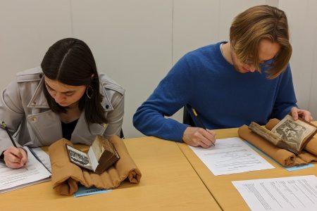 Students took a field trip to the Special Collections at the University of Iowa to look at period texts, recipe books, and journals.