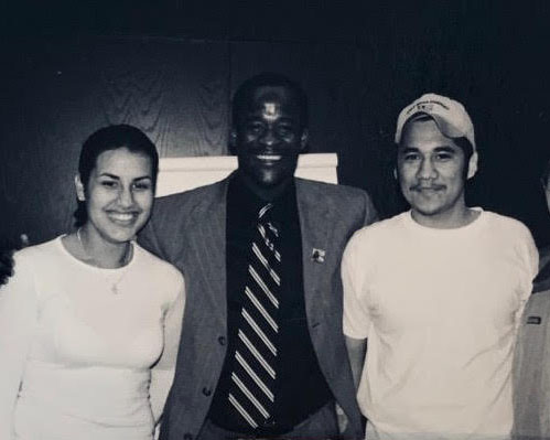 Eddie Moore Jr. ’89 (center), founder of the White Privilege Conference, with two work-study students who assisted him in its launch, Laura Gonzalez Muma ’03, and Jose A. Suarez ’03.