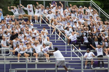  A large class has arrived on the Hilltop, and it took no time for them to get into the spirit at a football game against rival Coe College.